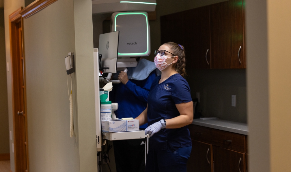 Dental patient receiving scan of their mouth and jaw