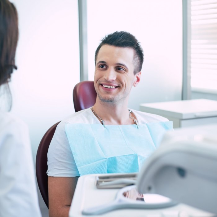 Man smiling in dental chair