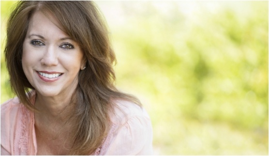 Brunette woman smiling outdoors