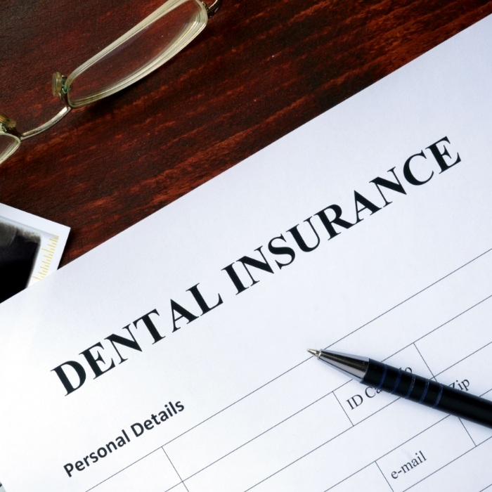 Dental insurance paperwork on a desk