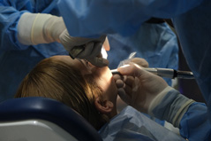 Woman getting dental treatment