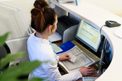 Receptionist at a desk