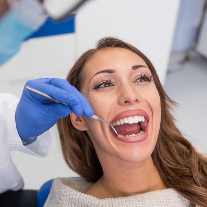 Woman receiving a dental checkup